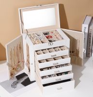 White five drawer leath...