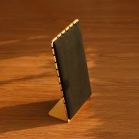 L-shaped gold edged vel...