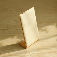 L-shaped gold edged vel...